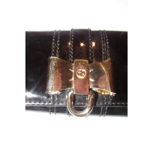 Gucci Black Patent Leather Duchessa Clutch W Gold Bow Accent
